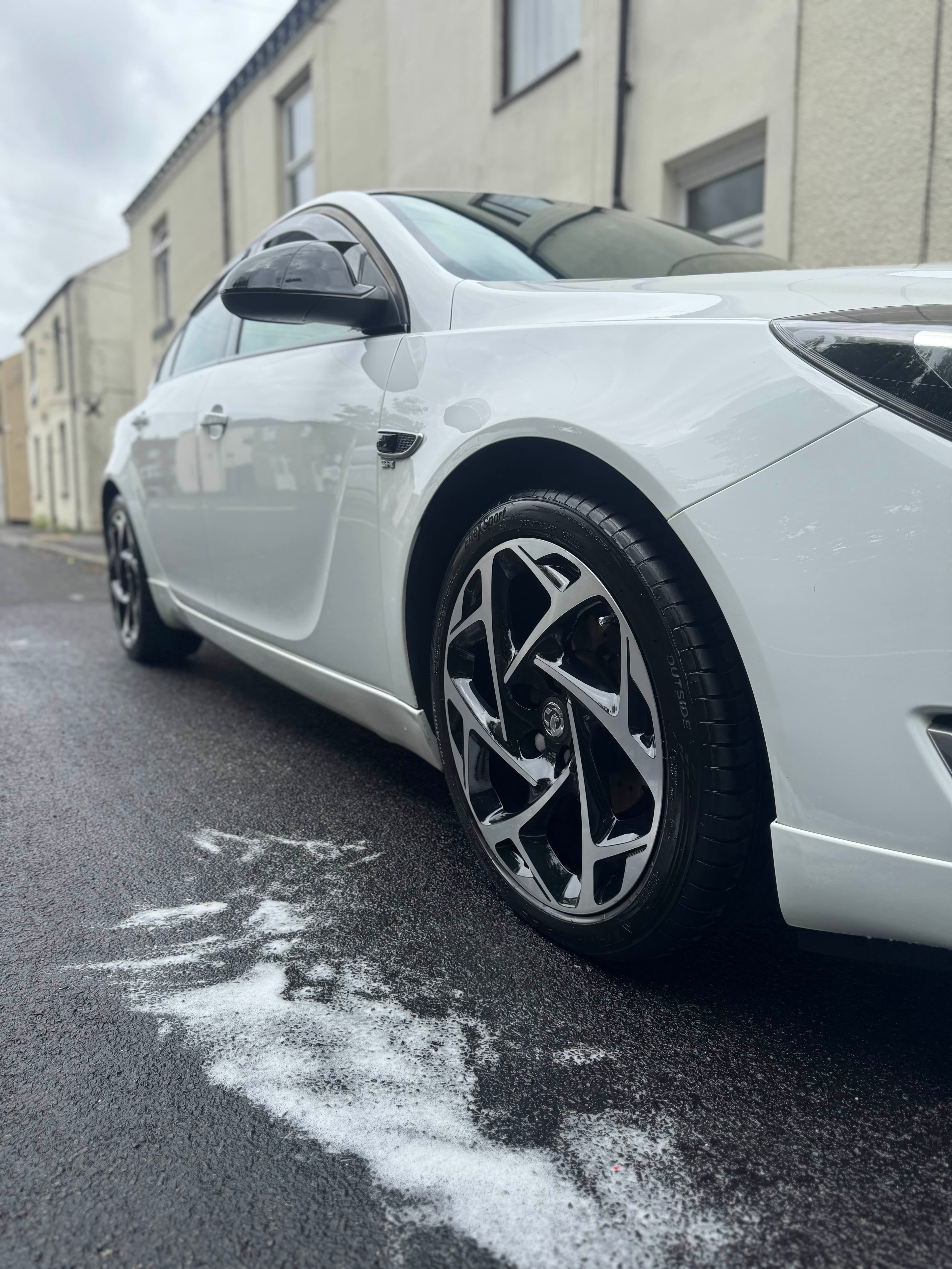 White hatchback after a full exterior valet