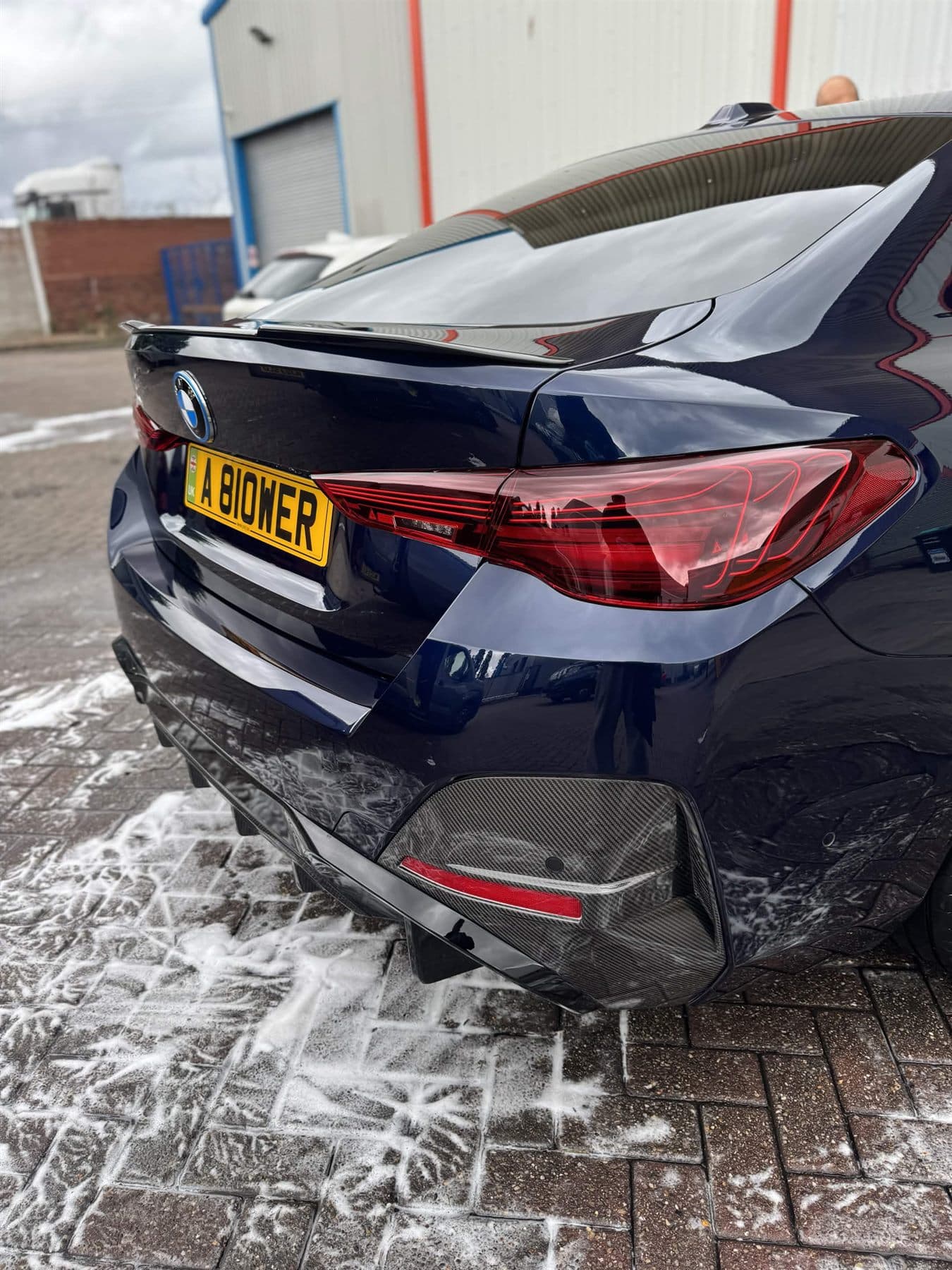 Blue BMW exterior after a maintenance clean