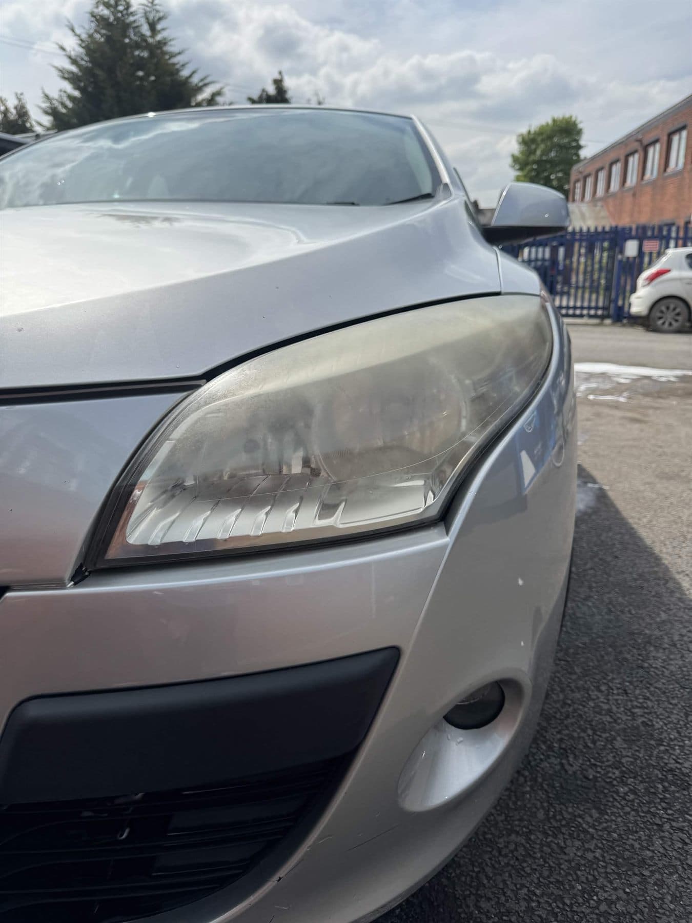 Cloudy headlight before restoration
