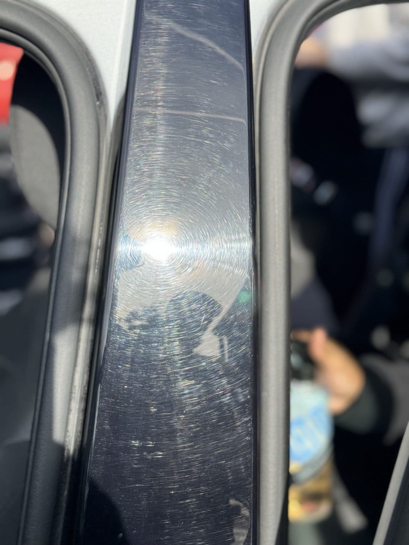 Pillar trim before machine polishing with visible haze