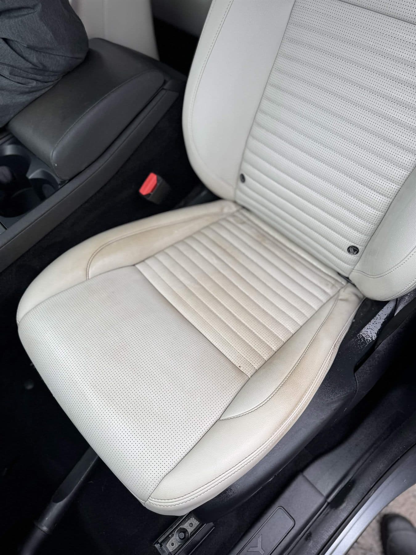 Light car seat before stain removal
