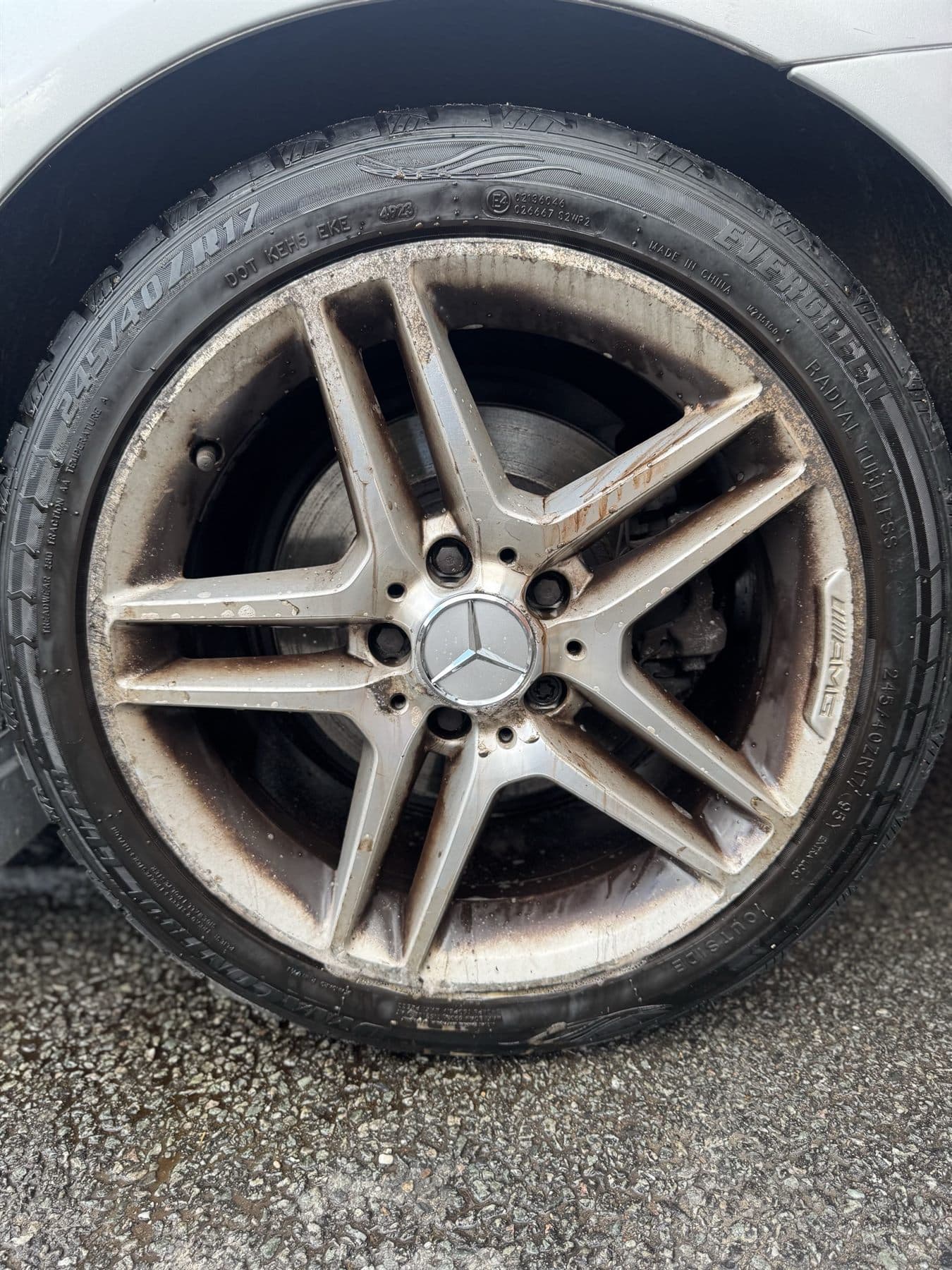 Wheel before tar and grime removal